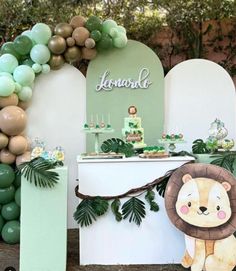 a lion themed birthday party with balloons and decorations