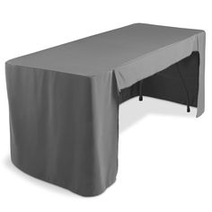 a table with a gray cover on it