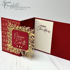 a close up of a card with a snowflake design on the front and side