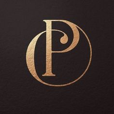 the letter p is inscribed in gold on a black background with a circular pattern around it