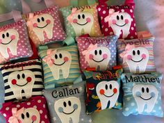 a group of pillows that have different designs on them, all decorated with toothpaste