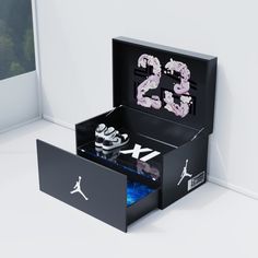 an open box with the number twenty five in it