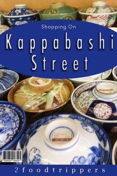 the cover of shopping on kapabashi street, featuring blue and white dishes