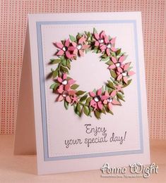 a handmade card with pink flowers on it