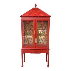 This exquisite one of a kind china cabinet is truly a work of art.  Beautiful antiqued red finish with a gold interior with graceful artistic birds.  Illuminated to showcase your treasures or collection.  I love that this is on legs and the pagoda top is just beyond fabulous.  Trimmed out in faux bamboo and with an ornate finial on top.  All brand new heavy 3/8 inch tempered glass shelves.  New gold bamboo hardware that is extra long.    Every bamboo band  on the pagoda top is hand painted. The Bamboo China Cabinet, Modern Neoclassical Interior, Chinoiserie Cabinet, Bamboo Hardware, China Cabinet Bar, Modern Neoclassical, Red Chinoiserie, Corner Display Cabinet, Painted China Cabinets