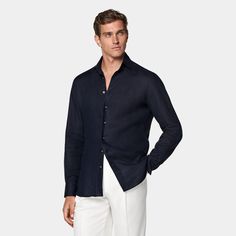 This casual navy tailored fit shirt is cut to a shorter length for versatile styling, and crafted with ultra-fine stitching, heat-sealed buttons and classic widespread collar. Custom Tuxedo, Perfect White Shirt, Flannel Suit, Suits Office, Custom Made Suits, Safari Shirt, Denim Shirt Men, Office Clothes, Tuxedo Shirts