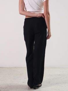 Experience ultimate comfort and style with our Black Dusk Pants. Made with a drawstring waist and a relaxed fit, these pants are perfect for throwing on and heading out. Crafted from a cotton blend, they are as comfortable as they are stylish. PRODUCT DETAILS: 85% Cotton 15% Polyester Runs slim through the hips SIZE GUIDE (in inches) SIZE XS S M L XL WAIST 26.5 27.5 29.3 33 35.5 HIP 37 38 40.8 43.3 45.8 Model is wearing size S / Model is 5'8”Dry clean onlyApproximate measurements taken from flat Relaxed Wide Leg Pants With Elastic Waistband For Work, Casual Straight Hem Dress Pants, Versatile Wide-leg Sweatpants For Work, Relaxed Straight Leg Work Pants, Versatile Wide Leg Sweatpants For Work, Athleisure High-waisted Sweatpants For Workwear, Versatile Straight Leg Sweatpants With Elastic Waistband, Versatile Sweatpants With Elastic Waistband And Straight Leg, Chic Black Bottoms With Straight Hem