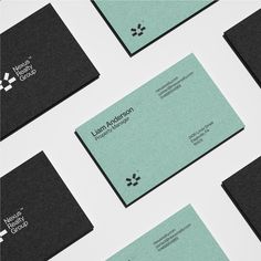 several business cards on top of each other