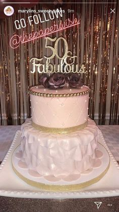 a wedding cake with the number 50 on it