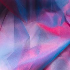 an abstract image of pink and blue fabric