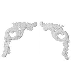 two white decorative brackets on a white background