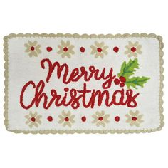 a christmas door mat with the words merry christmas on it