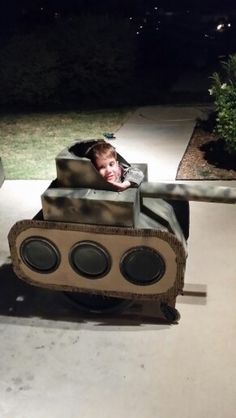 a small child in a tank costume