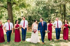 a bride and groom with their bridal party