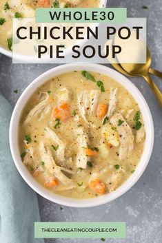 two bowls of chicken and dumpling soup with spoons next to it on a gray surface