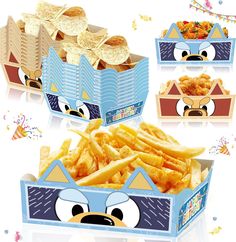 some kind of box that is filled with fries and other things to eat in it