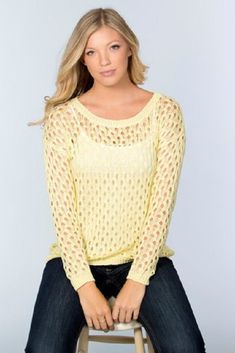 Step into the essence of summer with our Lightweight Yellow Honeycomb Sweater. Designed with a timeless boat-neck, this piece captures the delicate dance of summer rays through its open, flowy knit pattern. The sweater's slightly longer length gives it a flattering edge, ensuring you look your classy best every time you don it. Crafted with a soft, summery cotton blend, this sweater promises breathable comfort, perfect for those warm weather outings. Features: Boat Neck: A neckline that exudes e Summer Ray, Boat Neck Tops, Form Fitting Dress, Online Clothing Boutiques, Yellow Sweater, Knit Pattern, Crochet Sweater, Knit Patterns, Boat Neck