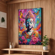 a buddha painting on a wall next to a wooden shelf with a potted plant