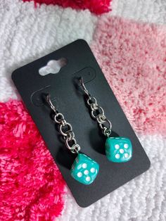 These Dice Earrings are made using 100% stainless steel jump rings and lever-back hooks. The dice are a mint/seafoam green color swirled with iridescent pearl. They measure 2.25 inches in total length. No two pairs are exactly the same as all dice are hand-screwed by me. Dice Septum Ring, Dice Jewelry, D20 Earrings, Dnd Dice Necklace, 20 Sided Dice Earrings, Seafoam Green Color, Iridescent Pearl, Color Swirl, Jump Rings