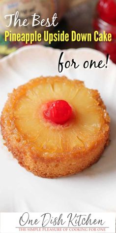 a pineapple upside down cake on a white plate with the words, the best pineapple upside down cake for one