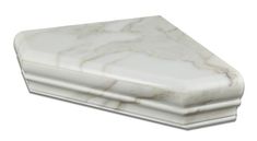 a white marble box sitting on top of a table