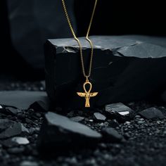 This solid gold key of Ankh necklace showcases exquisite craftsmanship, symbolizing life and spirituality. The key of Ankh pendant is more than just jewelry; it's a fine representation of ancient Egyptian elegance and the timeless allure of this sacred symbol. PENDANT INFORMATIONThis pendant is made of real, solid gold.• Made in USA• Material: 14k or 18k solid gold• Finish: polished• Height: 1.48 (37,5 mm) | *includes the small circle, bail dimensions not included• Width: 1.17" (30 mm)• Pendant Symbolic Ankh Ceremonial Jewelry, Amulet Style Ankh Necklace In Brass, Gold Ankh Necklace For Ceremonial Occasions, Symbolic Ankh Brass Necklace, Ceremonial Ankh Amulet Necklace, Luxury Gold Ankh Jewelry, Spiritual Ankh Necklace In Yellow Gold, Spiritual Ankh Necklace For Ceremonial Use, Yellow Gold Ankh Necklace Hallmarked