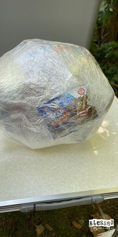 a plastic bag sitting on top of a table