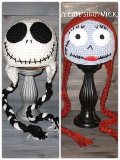 two crocheted hats with faces on them, one is red and the other is white