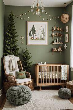 a baby's room decorated in green and white with christmas decorations on the wall