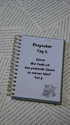 a notebook with the words preptober tag 4 written in german on top of it