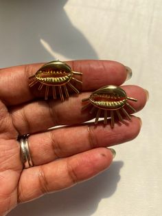 These studs are simple, but they still make a statement. Material: Brass Measurements: 26x20mm This listing is for one pair of cowrie shell studs. Each pair comes with a jewelry polishing cloth. Nigerian Tribes, Cowrie Shell Earrings, Afrocentric Earrings, Cowrie Shell, Shell Earrings, Brass Earrings, Jewelry Earrings Studs, Etsy Earrings, Shells