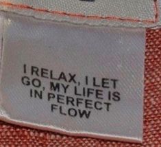 a label that says relax, let go my life is in perfect flow