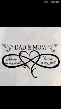 the words dad and mom are written in black ink on a white paper with two hearts