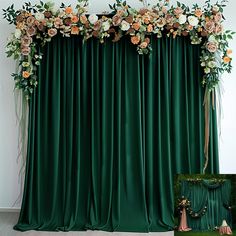 a green curtain with flowers and greenery on it, next to a photo frame