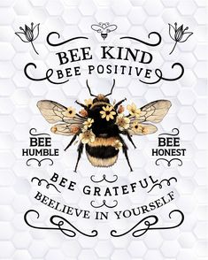 a bee is sitting on top of a wooden sign with the words be kind of positive