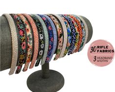 the headband stand is made from fabric and has five different designs on each side