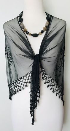 Fabulous, elegant vintage black mesh triangle beaded shawl with embellished beaded fringe. This is a beautifully crafted handmade treasure. Timeless piece can be worn with jeans or dress up for more formal. As new never been worn. Will look stunning on any occasion or with just  a silk camisole underneath. Measurements:  Width across top of triangle: 147 cm Top centre to Bottom V: 84 cm Always available for any questions you may have! Thanks for stopping by.🌸🙏 Beaded Shawl, Shawl Black, Bead Fringe, Triangle Shawl, Fringe Shawl, Triangle Shawls, Silk Camisole, Beaded Fringe, Mode Vintage