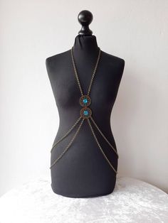 Bodychain, body chain, harness, body necklace, body jewelry, boho necklace, handmade bodychain, tribal fusion necklace, festival outfit Beautiful and elegant handmade bodychain. This boho accessory is made with silver chains, has two pieces in the center in the form of mandalas. This bodynecklace is ideal to wear on any occasion as it is comfortable, easy to wear and brings an original style to any outfit. You can customize this necklace, change its shape, choose a bronze or gold chain For perso Bohemian Adjustable Waist Chain For Party, Adjustable Chain Body Jewelry For Festivals, Handmade Adjustable Body Jewelry For Festivals, Bohemian Body Jewelry With Adjustable Chain For Summer, Bohemian Adjustable Body Chain For Party, Summer Festival Metal Body Jewelry, Bohemian Waist Chain With Adjustable Chain For Party, Bohemian Chain Necklaces For Summer, Handmade Adjustable Bohemian Body Jewelry