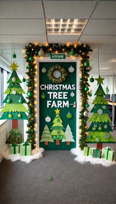 an office decorated for christmas with trees and presents on the front door that says christmas tree farm