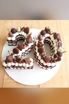 a cake that is shaped like the number twenty five with chocolate and white frosting