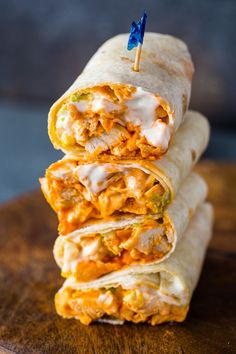 three burritos stacked on top of each other