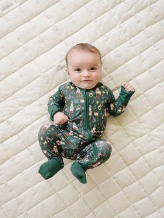 Crafted from ultra-soft + breathable bamboo fabric, this festive set ensures a cozy + comfortable night's sleep. Ideal for Christmas morning photos, holiday movie nights, or simply enjoying the winter season together in style. Get ready to create lasting traditions with this charming Nutcracker-themed set! Each pajama 0-3m up to 18m have hand + foot cuffs. Wash in cold water , tumble dry on low Fit True to Size 95% Bamboo 5% Spandex Measurements in inches from neck to ankle: Width: NB 8.5, 0-3m Green Nutcracker, Holiday Movie Night, Adult Pajamas, Toddler Accessories, Swaddle Sets, Onesie Pajamas, Cozy Pajamas, Baby Co, Holiday Movie