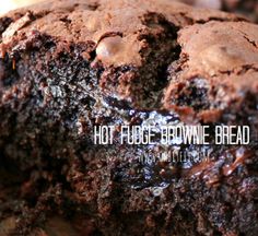 a close up of a chocolate brownie on a wooden table with the words hot fudge brownie bread