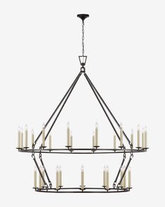 a chandelier with many candles hanging from it's center point, on a white background