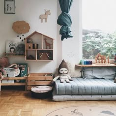 a child's room with toys and bookshelves