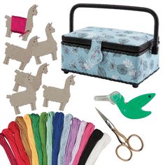 the sewing kit includes scissors, thread, and other crafting supplies for making llamas