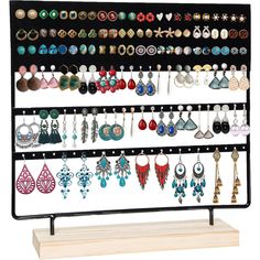 a display case with earrings on it