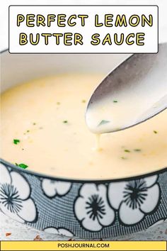 a spoon in a bowl filled with butter sauce