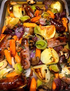 a pan filled with lots of different types of food