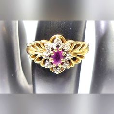 Pre Owned In Great Condition 10k Ruby And Diamond Ring Size 6, 2.28 Grams. Sold As Is Elegant Gold Cluster Birthstone Ring, Gold Oval Ruby Ring With Diamond Accents, Collectible Yellow Gold Jewelry With Accent Stones, Formal Yellow Gold Cluster Birthstone Ring, Formal Cluster Yellow Gold Birthstone Ring, Gold Cluster Ruby Ring Hallmarked, Gold Cluster Ruby Ring, Hallmarked, 14k Gold Ruby Ring With Diamond Accents, Yellow Gold Ruby Cluster Ring With Diamond Accents